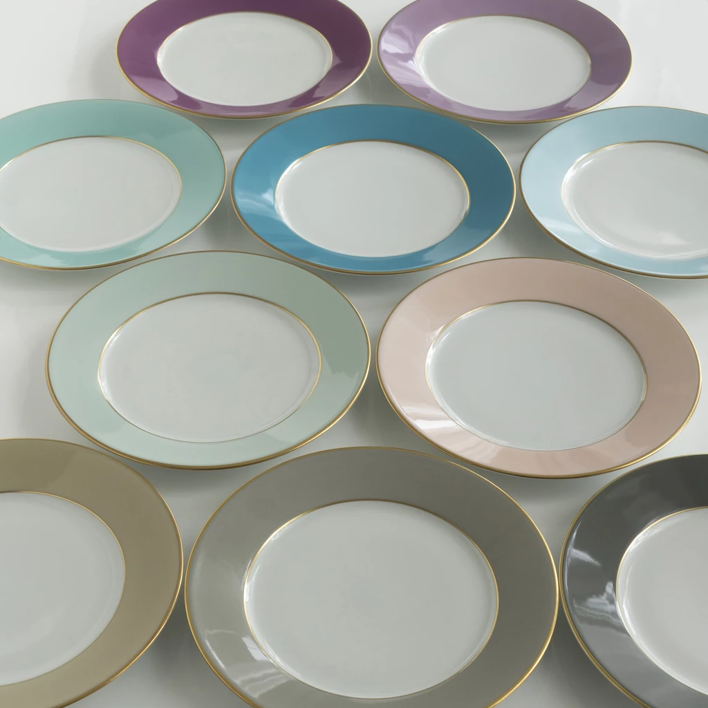 Porcelaine de Limoges Dessertteller mit Golddekor