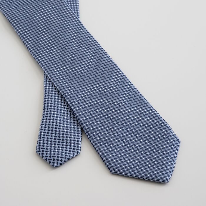 Krawatten vom Comer See Jacquardmuster auf blauem Grund